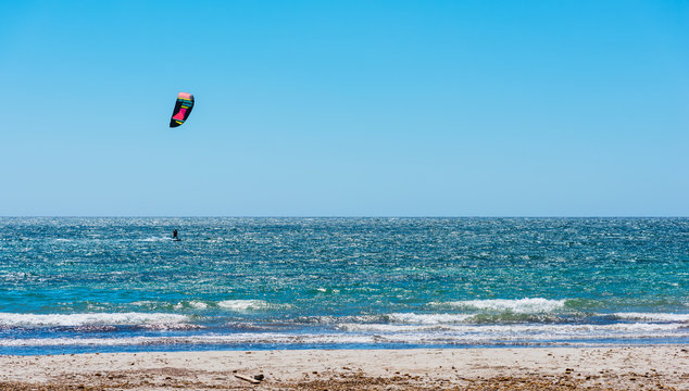 Kite surfing on a clear day