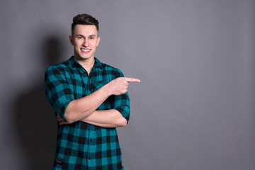 Young handsome man studio portrait, boy style