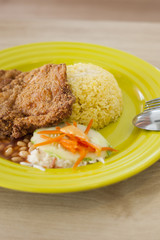 Delicious chicken cutlet served with rice.