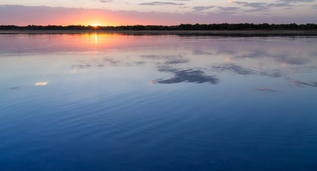 sunset on the lake as a backdrop