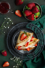 crepes served with cream cheese and fresh strawberry,