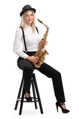 Female jazz musician with a saxophone sitting on a chair