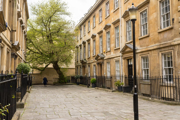 UK street pedestrian alley with traditional Georgian townhouses and Victorian apartments buidings