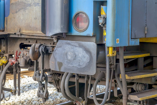 Rusty railway wagon metal bumpers close-up