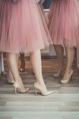 Women wearing nude colored tulle skirts