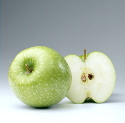 Green apples on a white background