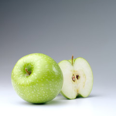 Green apples on a white background