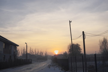 zimowy wschód słońca
