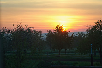 Fototapeta premium Sunrise over a hil