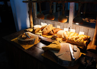 breakfast with freshly baked bread on the wood table