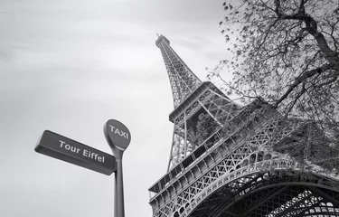 Fotobehang Eiffel Tower or Tour Eiffel in Paris in Spring, black and white picture © Savvapanf Photo ©