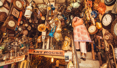 Store with vintage furniture, art objects and antiques on second-hand market