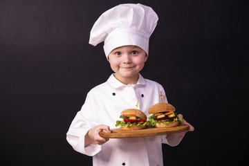 Funny boy and hamburger