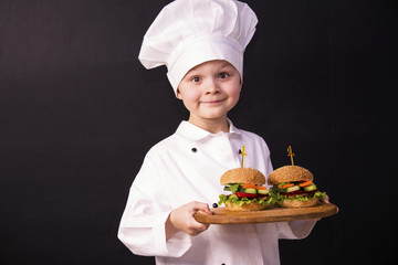 Funny boy and hamburger