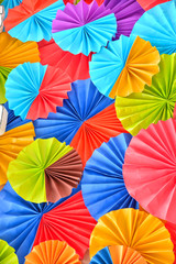 Fototapeta na wymiar Background of colorful paper fans
