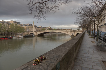 Love locks on the banks of river Seine in Paris