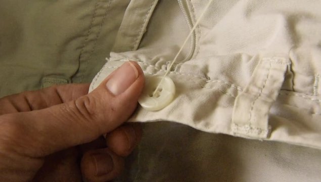 Sewing  a button