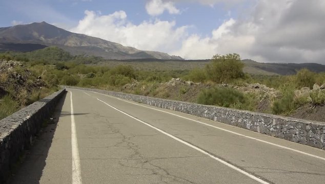 View of the volcano Etna, Sicily, Italy from the road that leads to the top