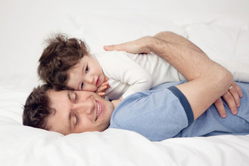 Father cuddling his baby girl