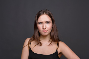 Fototapeta premium Woman expressing doubt