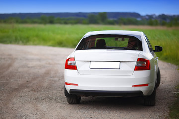 Obraz na płótnie Canvas Rear-side view of a car