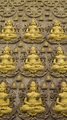 Fototapeta na wymiar Wallpaper of buddha on temple wall, Bangkok Thailand