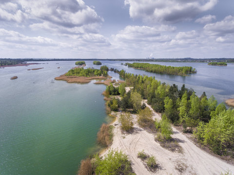 Lake and forest during spring time. View from above. Pogoria IV in Dabrowa Gornicza, Poland.