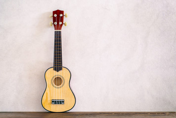 Fototapeta premium Ukulele on backdrop