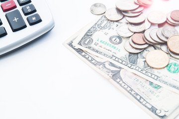 Fototapeta premium Money coins with sunlight on white background, Selective focus