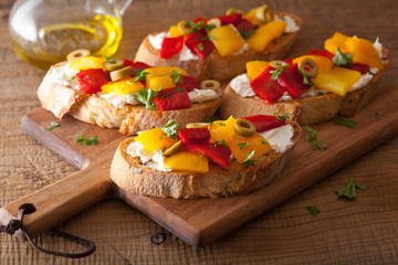 italian bruschetta with peppers goat cheese olives