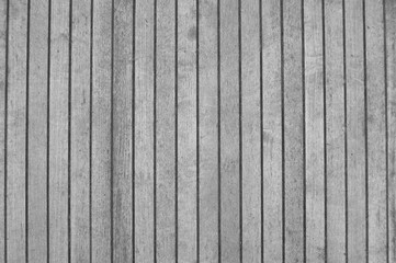 gray old wooden fence. wood palisade background. planks texture