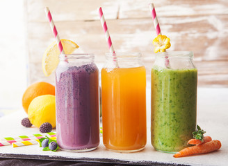 fruit and vegetables smoothies in glass bottles