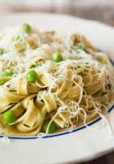 Italian pasta fettuccine with spinach