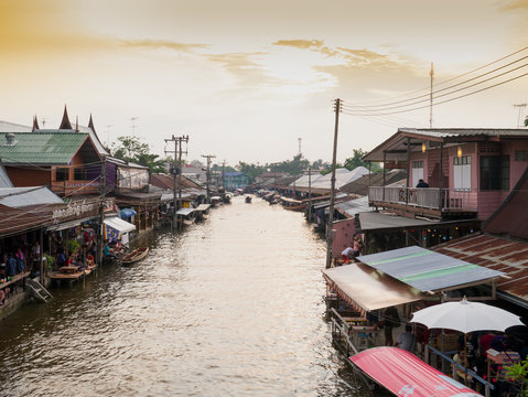 AMPAWA - OCT 2015 : the favourite floating market in Samut Songkram Provine thailand, with golden sunshine in evening