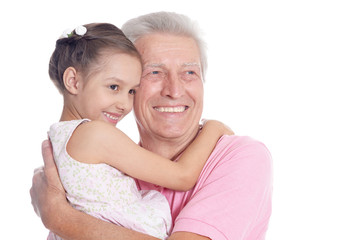 Grandfather and little granddaughter on white background