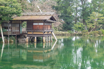 Fototapeta na wymiar Japanese Traditional Hut build on the Lake in the Public Garden
