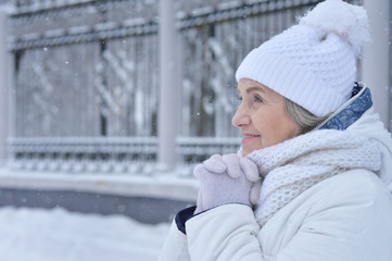 Senior woman in frosty winter
