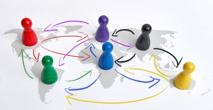 Concept for globalization, global networking, travel or global connection. Colorful figures with connecting arrows.