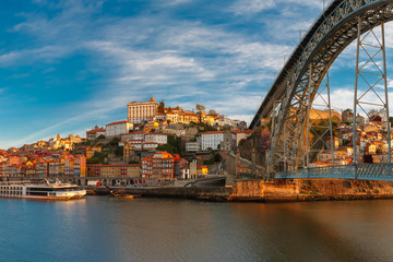 Douro river, Ribeira and Dom Luis I or Luiz I iron bridge in the sunny morning Porto, Portugal.