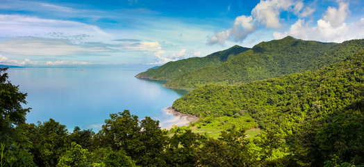 Panoramic view of the azure bay and forest hills, Indonesia