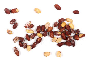 pile salted fried peanuts isolated on white background, top view