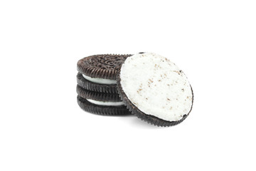 Chocolate cream cookies on white background.