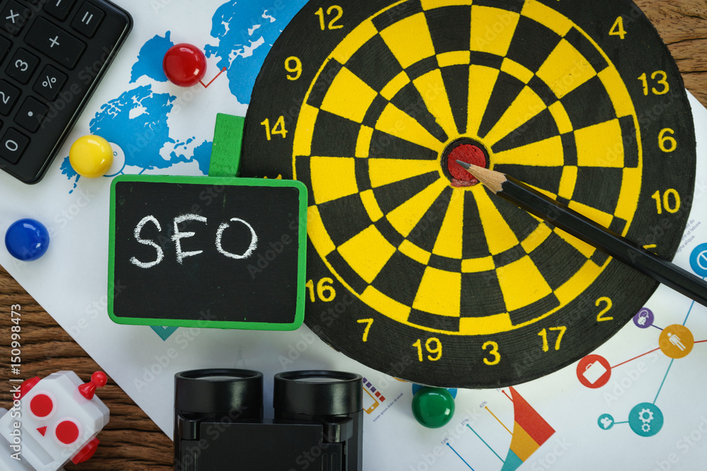 Poster top view of seo (search engine optimization) website promotion concept with pencil, dart, web analyt