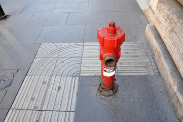 Red hydrant in the city