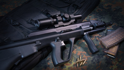 Black semiautomatic rifle with a scope on a vintage, old German military flecktarn camouflage...