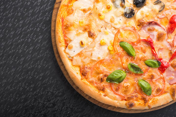 mix pizza with olive, bacon, basil and chicken