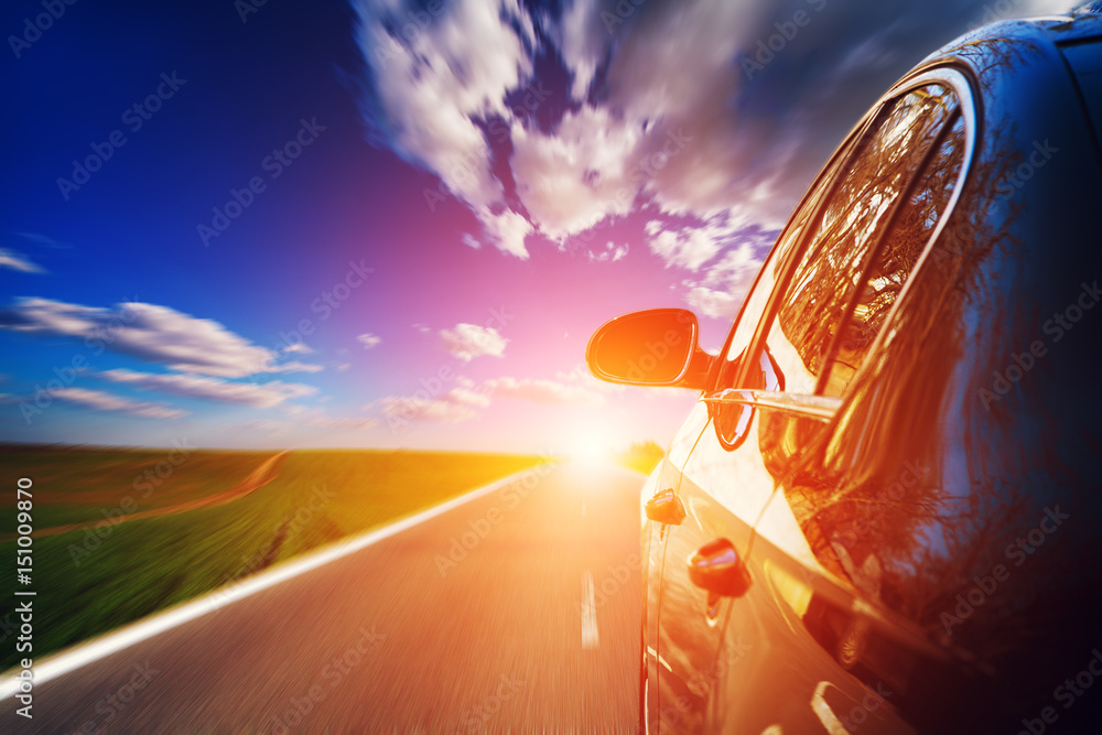 Wall mural Blurred road and car, speed motion background