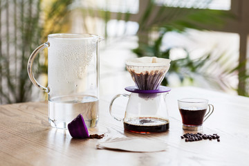 Drip brewing, filtered coffee, or pour-over is a method which involves pouring water over roasted, ground coffee beans contained in a filter.