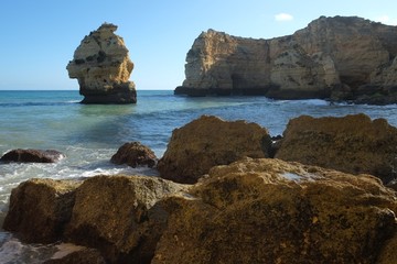 Fototapeta na wymiar Marinha beach with its beautiful cliffs scenery in Lagoa. Algarve, Portugal