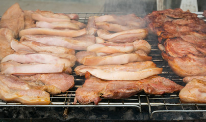 Street food in Thailand. Sales of pork, grilled or BBQ grill with charcoal. Shops in this style very popular with tourists and Thailand people.This store can be seen everywhere in Thailand.